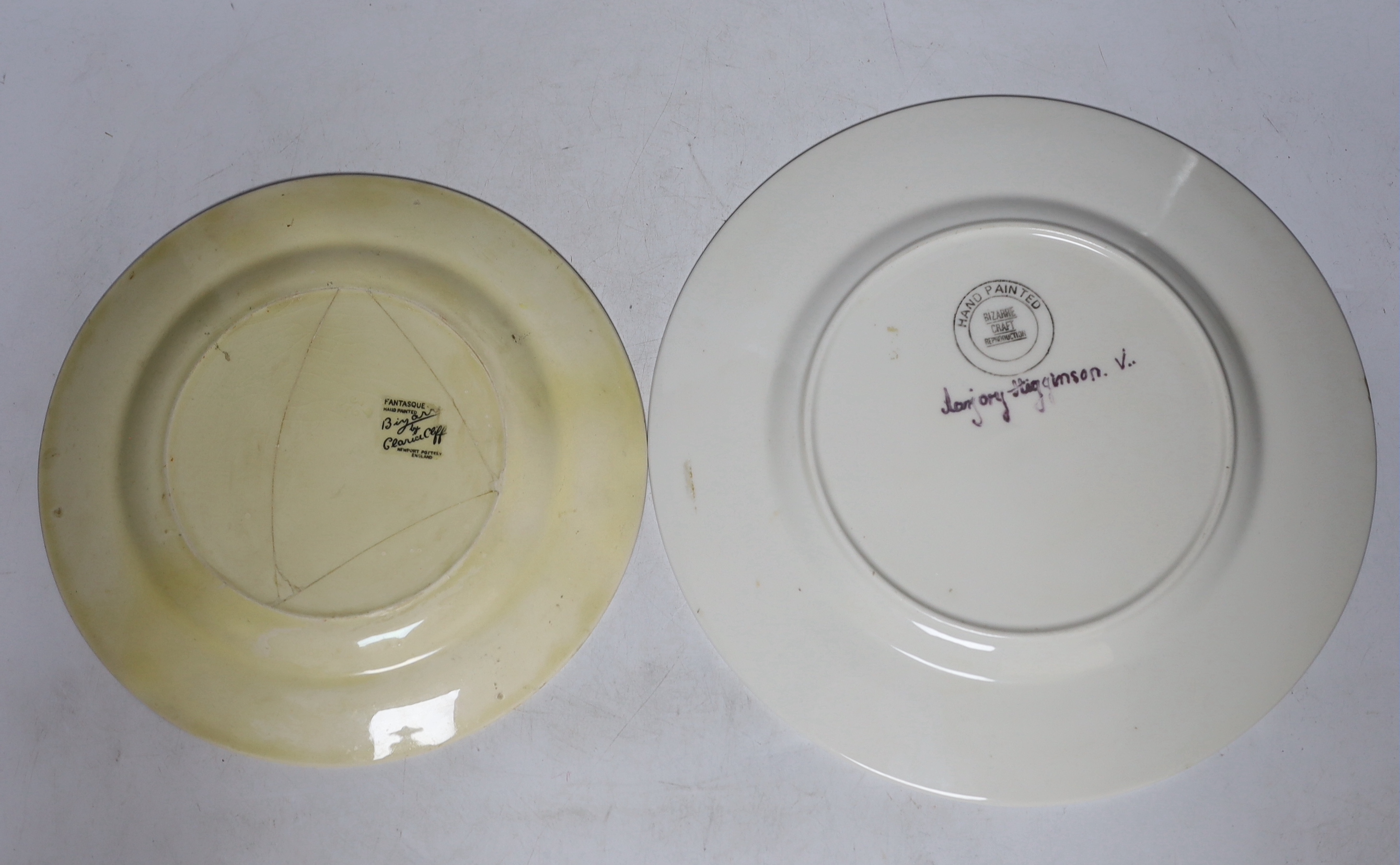 A Clarice Cliff 'Fantastisque' plate and another similar later Clarice Cliff style plate, largest 27cm diameter